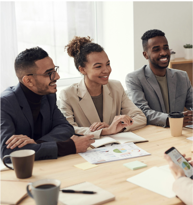 Professional business team meeting with diverse founders discussing sales strategies